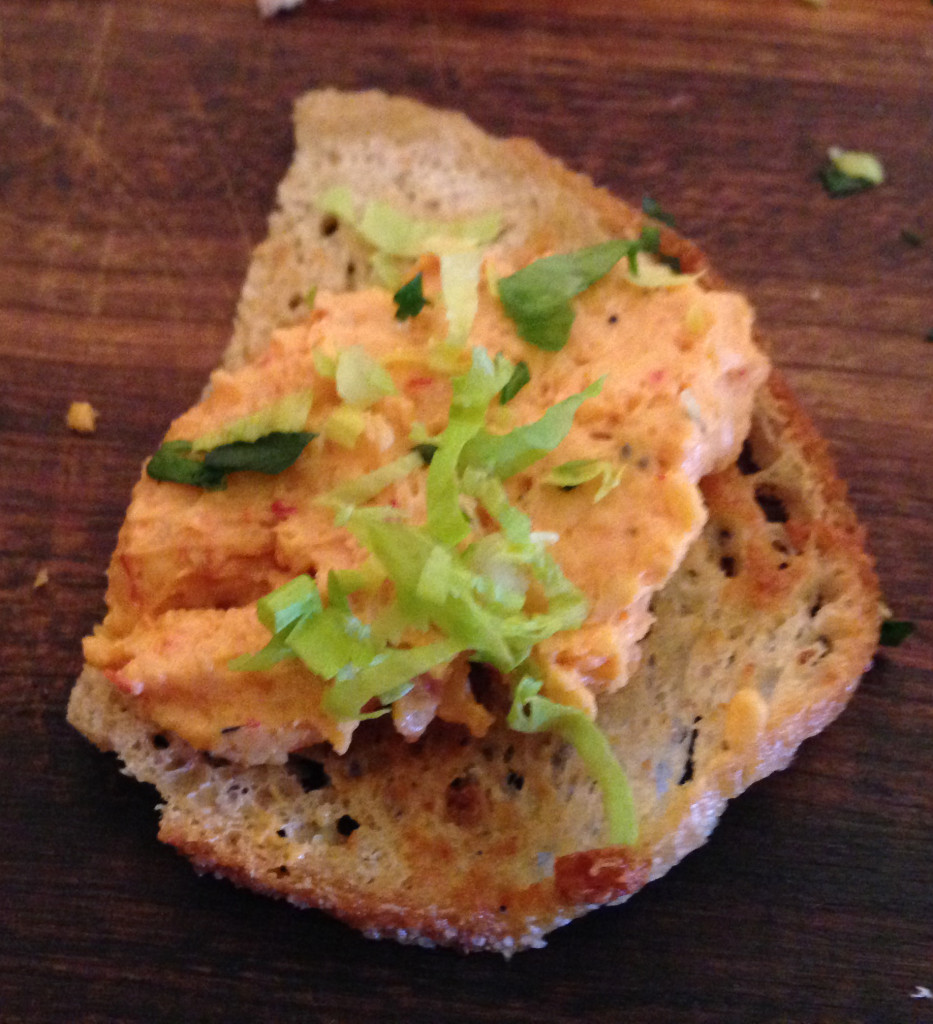 Pimento cheese topped with celery tips.