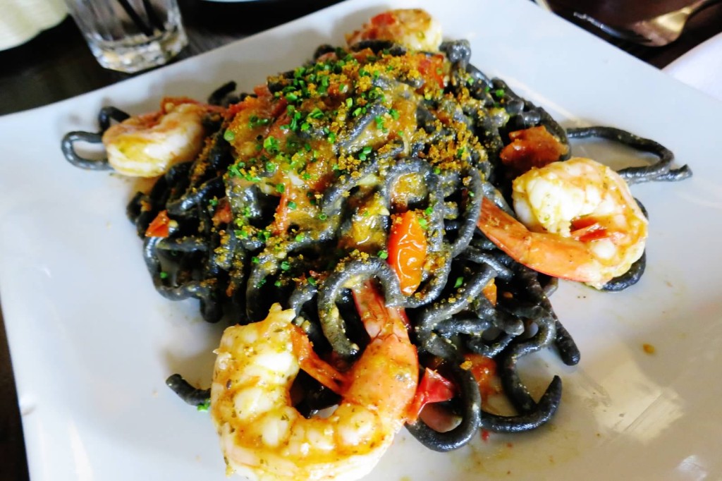 Bigoli Neri alla Bottarga--Black squid ink bigoli, organic cherry tomatoes, shrimp. and bottarga.