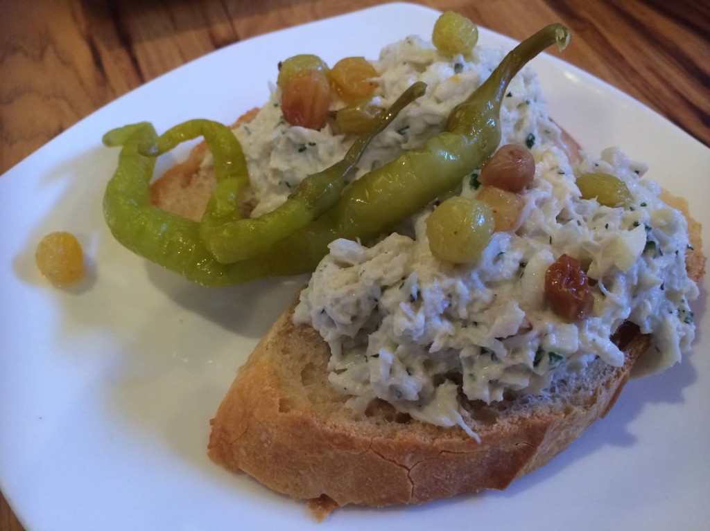 crab salad, creme fraiche, lemon and muscat-soaked raisins