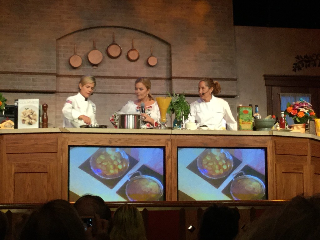 Cat Cora and Suzanne Tracht aboard the Ruby Princess hosting a food demonstration. 