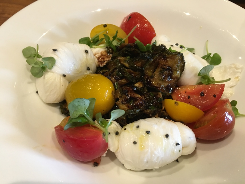 Fresh Mozzarella Knots. Zucchini "scapece", heirloom cherry tomatoes, micro basil, black salt.